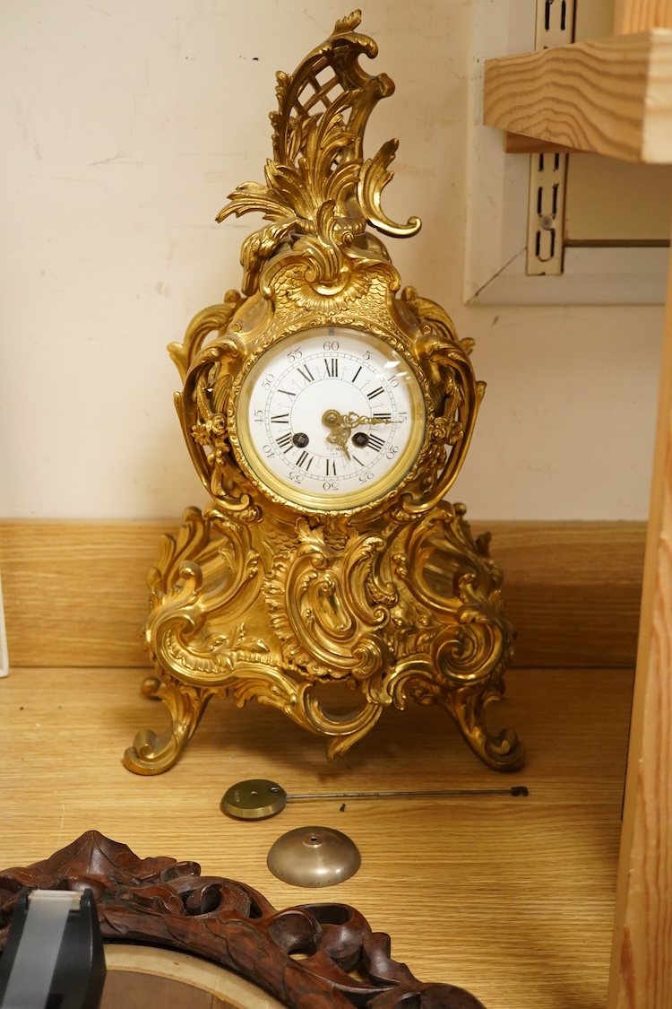 An early 20th century French Louis XV-style ormolu clock garniture - clock 50cm high